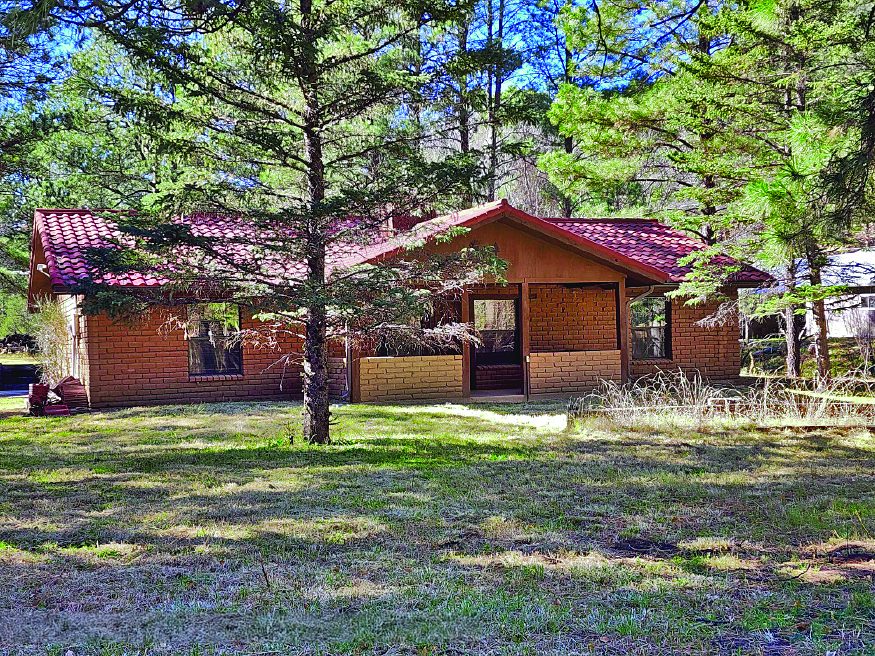 1.12 Acre Property — photo as printed in The Real Estate Roundup