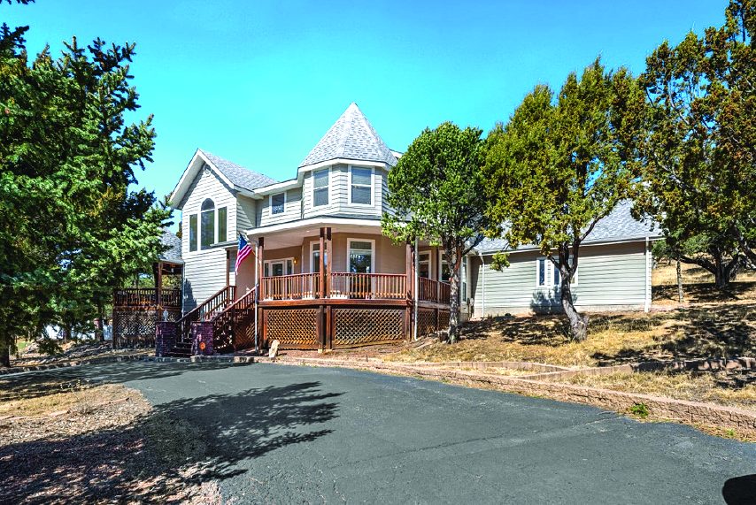 Property in Ruidoso — photo as printed in The Real Estate Roundup