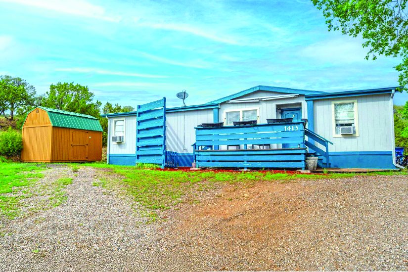Property in Ruidoso — photo as printed in The Real Estate Roundup