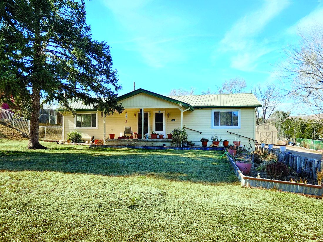 4 Bedroom Property — photo as printed in The Real Estate Roundup