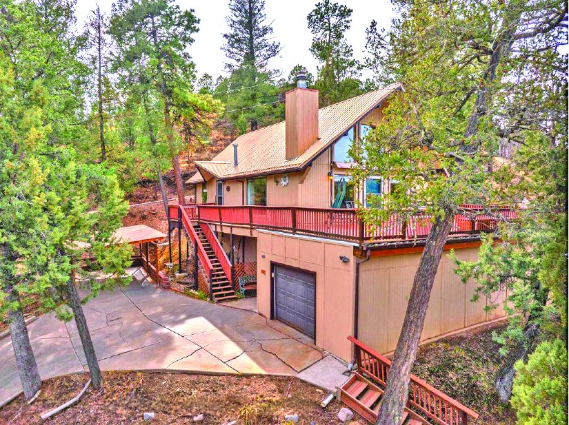 102 Winchester Road — photo as printed in The Real Estate Roundup