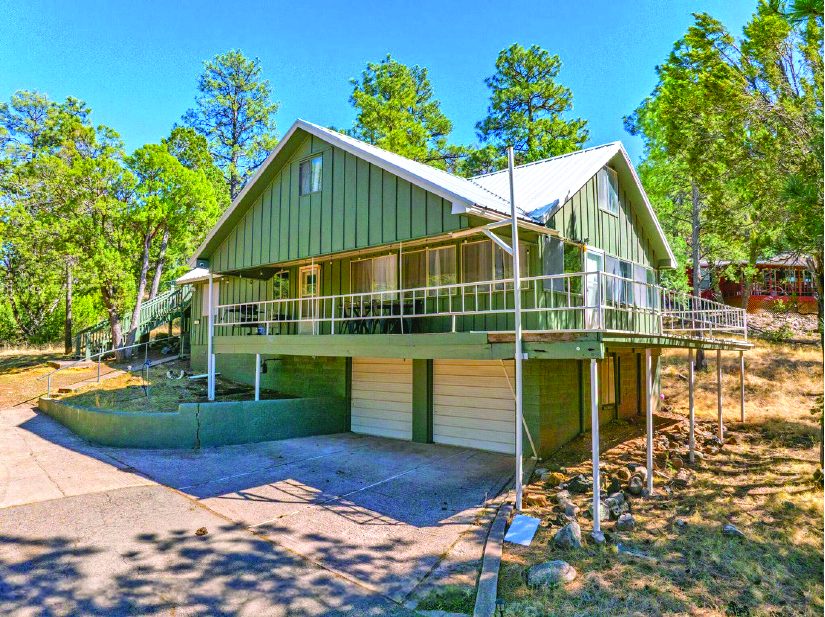 88 Swallow Drive — photo as printed in The Real Estate Roundup
