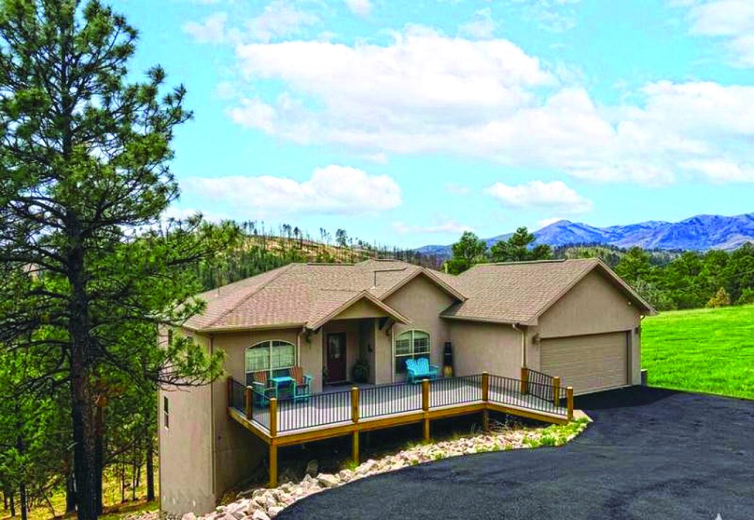 4 Bedroom Property — photo as printed in The Real Estate Roundup