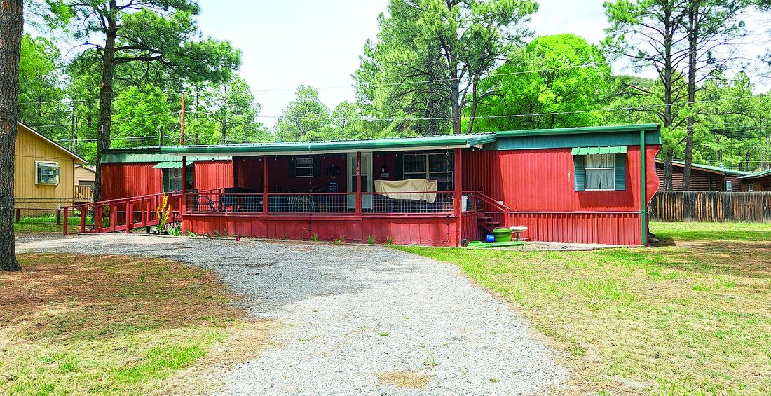 Property — photo as printed in The Real Estate Roundup