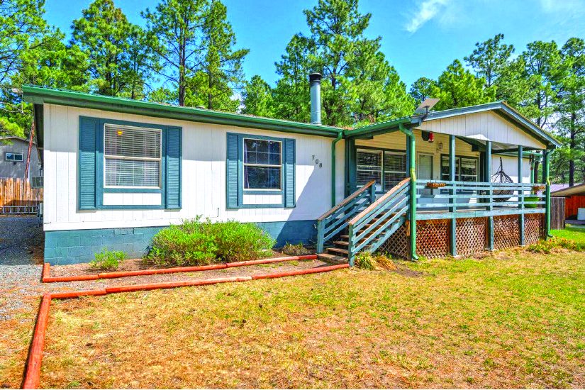 4 Bedroom Property — photo as printed in The Real Estate Roundup