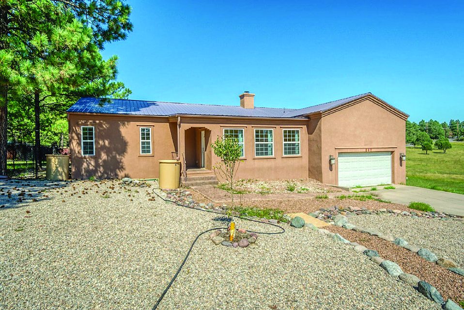 Property in Ruidoso — photo as printed in The Real Estate Roundup