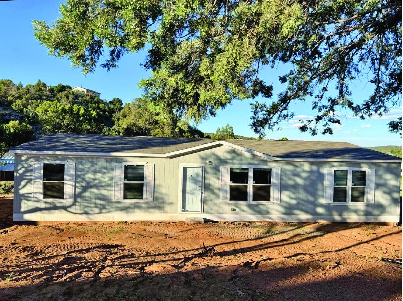 210 Maverick Court — photo as printed in The Real Estate Roundup