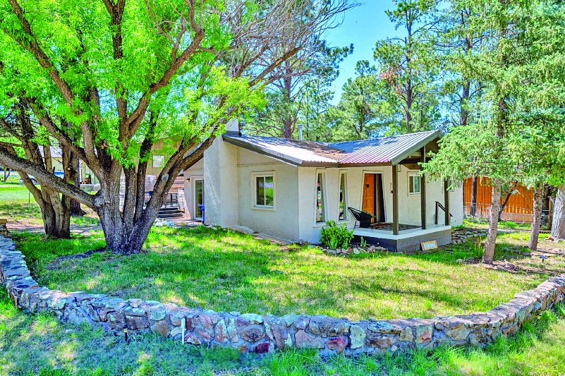 Property in Ruidoso — photo as printed in The Real Estate Roundup