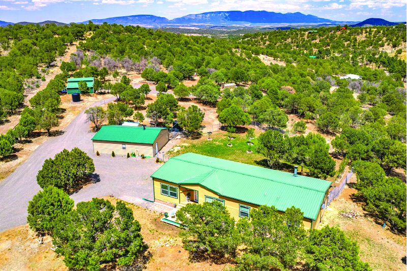 4 Bedroom Property — photo as printed in The Real Estate Roundup