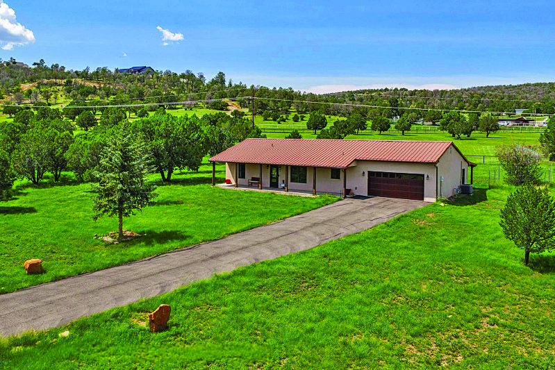 105 Reindeer Drive — photo as printed in The Real Estate Roundup