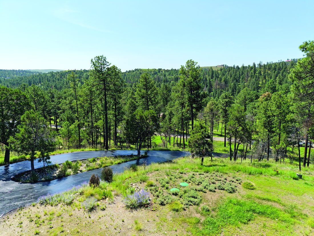 Property in Ruidoso — photo as printed in The Real Estate Roundup