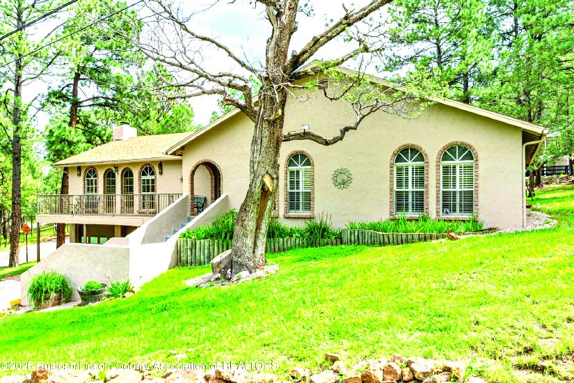 105 High Loop Drive — photo as printed in The Real Estate Roundup