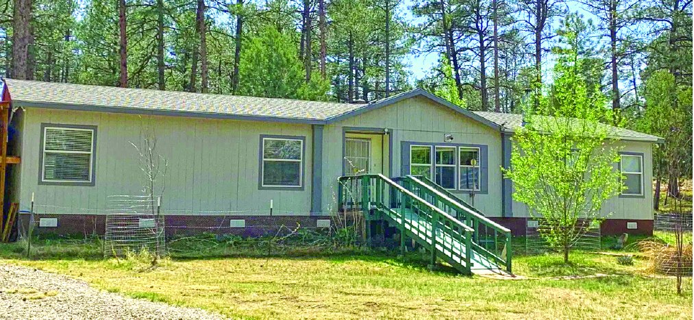 4 Bedroom 1.025 Acre Property — photo as printed in The Real Estate Roundup