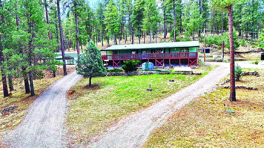 18 Carpenter Ln — photo as printed in The Real Estate Roundup