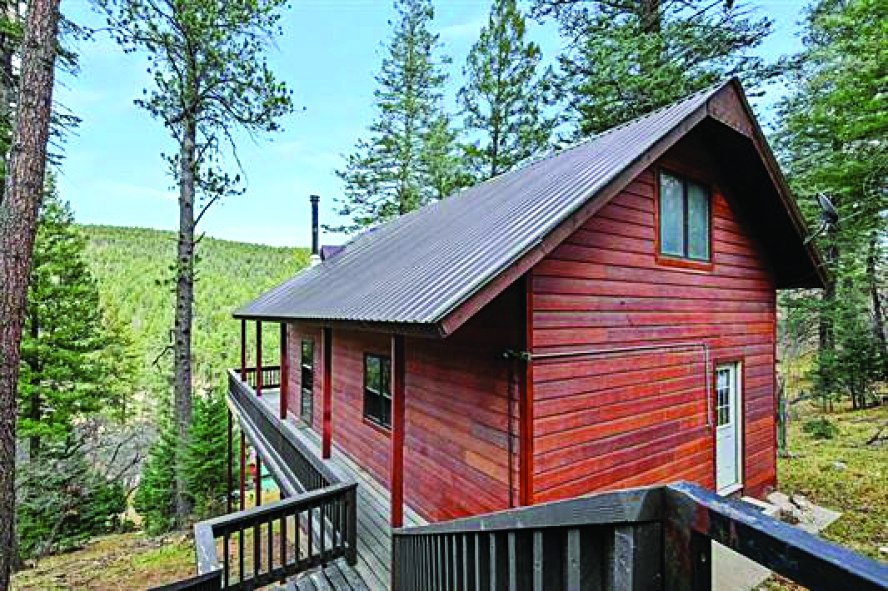 87 Canyon Trl: — photo as printed in The Real Estate Roundup